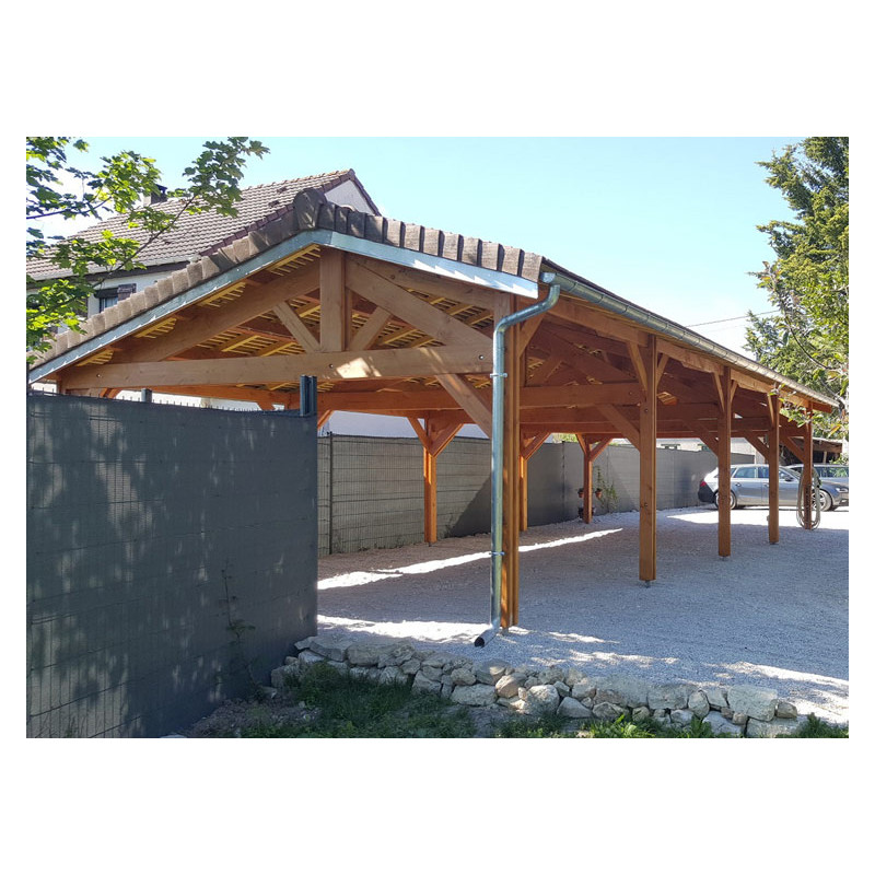 découvrez notre garage spacieux en bois, conçu pour accueillir jusqu'à 4 voitures. alliant esthétisme et fonctionnalité, ce garage offre une protection optimale contre les intempéries tout en ajoutant une touche chaleureuse à votre propriété.