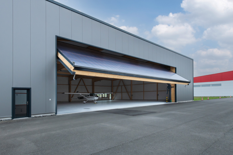 découvrez nos portes de hangar robustes et fonctionnelles, idéales pour protéger vos équipements et votre espace de travail. disponibles en plusieurs tailles et matériaux, elles garantissent un accès facile tout en offrant une excellente isolation. optez pour une solution durable et esthétique pour votre ouvrage!